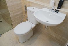 In-room Bathroom 5 Cozy Stay and Warm 2BR Apartment at Springwood Residence By Travelio