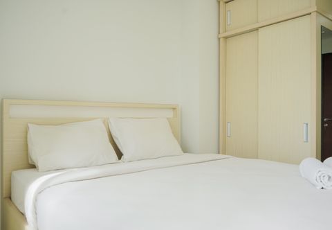 Bedroom Cozy Living Studio Springwood Residence Apartment near IKEA Alsut By Travelio