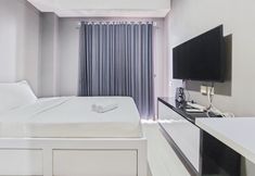 Bedroom 7 Luxury Studio Apartment at Springwood Residence Tangerang By Travelio