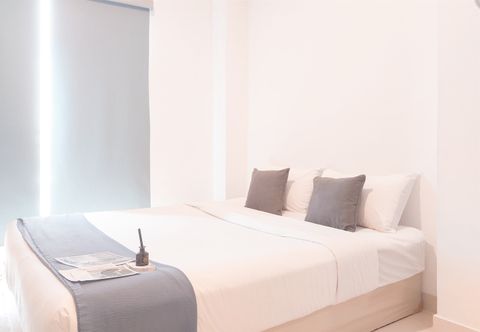 Bedroom Comfort Living Studio Apartment at Springwood Residence Tangerang By Travelio