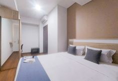 Kamar Tidur 6 Homey and Good Deal 1BR Apartment Springwood Residence Tangerang By Travelio