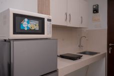 공용 공간 Cozy Studio Springwood Residence Tangerang Apartment By Travelio