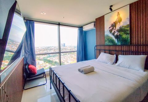 Bedroom Wonderful Thematic 2BR Apartment at Praxis By Travelio