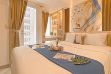 Bilik Tidur Comfort and Homey Stay Studio Tokyo Riverside PIK 2 Apartment By Travelio