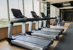 Fitness Center 5 Minimalist Studio Room Apartment at Springwood Residence Tangerang By Travelio
