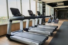 Fitness Center Minimalist Studio Room Apartment at Springwood Residence Tangerang By Travelio