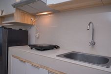 Common Space Minimalist Studio Room Apartment at Springwood Residence Tangerang By Travelio