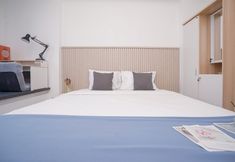Bilik Tidur 2 Warm and Cozy Studio at Collins Boulevard Apartment By Travelio