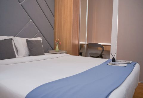 Bedroom Restful and Tidy Studio at Serpong Garden Apartment By Travelio