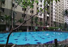 Swimming Pool 7 Spacious Cozy Living 3BR Apartment at Gateway Ahmad Yani Cicadas By Travelio