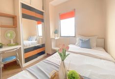 Bedroom 4 Spacious Cozy Living 3BR Apartment at Gateway Ahmad Yani Cicadas By Travelio