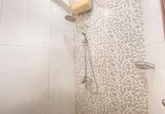 In-room Bathroom 3 Spacious Cozy Living 3BR Apartment at Gateway Ahmad Yani Cicadas By Travelio