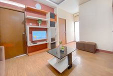 Common Space Spacious Cozy Living 3BR Apartment at Gateway Ahmad Yani Cicadas By Travelio