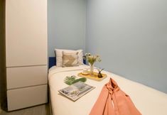 Bedroom 7 Cozy and Spacious 2BR at Apartment Meikarta By Travelio