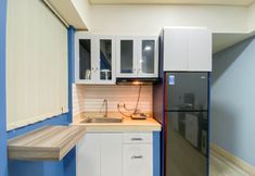 Common Space 6 Cozy and Spacious 2BR at Apartment Meikarta By Travelio