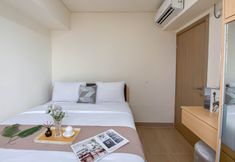 Bedroom 2 Good and Spacious 3BR at Meikarta Apartment By Travelio