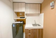 Common Space 4 Homey and Restful 1BR without Living Room at The Alton Apartment By Travelio