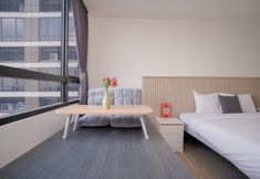 Bedroom 2 Spacious Comfy Studio Room Apartment at Collins Boulevard By Travelio