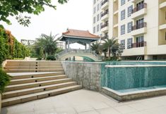 Swimming Pool 6 Comfortable and Spacious 3BR Apartment at Lucky Tower Residence By Travelio