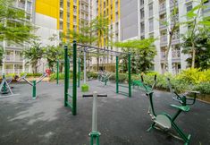 Fitness Center 4 Comfy and Good 2BR at Springlake Summarecon Bekasi Apartment By Travelio