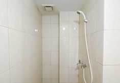 In-room Bathroom 7 Comfy and Good 2BR at Springlake Summarecon Bekasi Apartment By Travelio