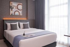 寝室 Good Deal Studio Apartment at Brooklyn Alam Sutera By Travelio