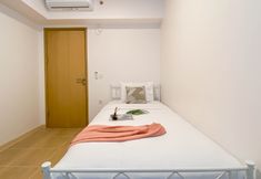 Bedroom 3 Enjoy Living 2BR Apartment with Working Room at Meikarta By Travelio