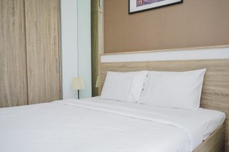 臥室 4 Cozy Design Furnished Studio Springwood Residence Tangerang Apartment By Travelio