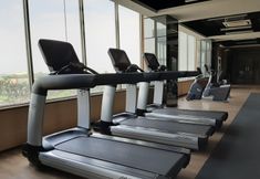Fitness Center 7 Relaxing and Elegant Studio Apartment at Springwood Residence By Travelio