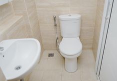 In-room Bathroom 5 Relaxing and Elegant Studio Apartment at Springwood Residence By Travelio