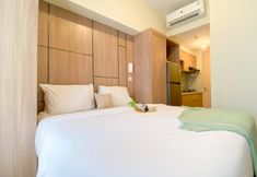 Bedroom 3 Good Look and Tidy Studio Tokyo Riverside PIK 2 Apartment By Travelio