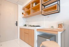 Common Space 5 Good and Warm Studio Room at Tokyo Riverside PIK 2 Apartment By Travelio