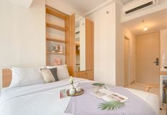 Bedroom 3 Good and Warm Studio Room at Tokyo Riverside PIK 2 Apartment By Travelio