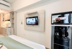 Bedroom 4 Homey Furnished and Restful Studio at Tokyo Riverside PIK 2 Apartment By Travelio