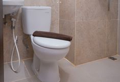 In-room Bathroom 6 Cozy Studio at Transpark Bintaro Apartment By Travelio
