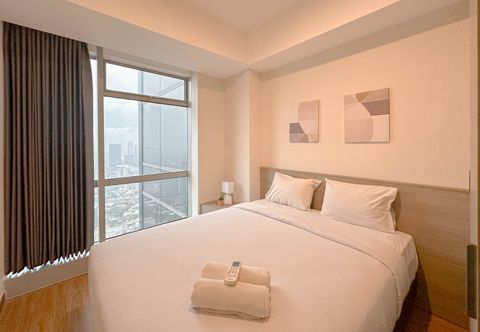 Bedroom Good Designed 1BR at Grand Sungkono Lagoon Apartment By Travelio