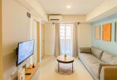 Lobby 7 Cozy and Spacious 2BR with Extra Room at Meikarta Apartment By Travelio