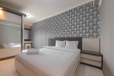 Bedroom Cozy Stay 3BR Gateway Ahmad Yani Cicadas Apartment By Travelio