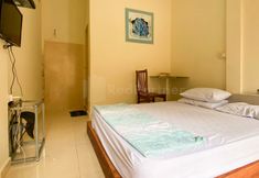 Kamar Tidur 4 Wisma Pinggir Mitra RedDoorz