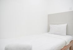 Bedroom 3 Strategic and Homey 2BR at Bassura City Apartment By Travelio