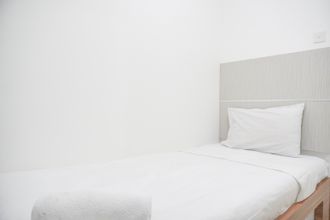 Bedroom 4 Strategic and Homey 2BR at Bassura City Apartment By Travelio