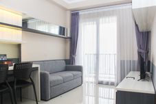 Common Space Cozy Living and Comfort 1BR at Signature Park Grande Apartment By Travelio