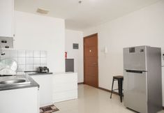 公共空間 6 Comfortable and Spacious 2BR at Green Bay Condominium Apartment By Travelio