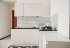 公共空間 3 Comfortable and Spacious 2BR at Green Bay Condominium Apartment By Travelio