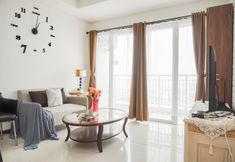 Common Space 5 Comfortable and Spacious 2BR at Green Bay Condominium Apartment By Travelio