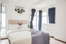 臥室 Comfortable and Spacious 2BR at Green Bay Condominium Apartment By Travelio