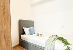Bedroom 2 Homey and Quiet 2BR with Extra Room Apartment Sky House BSD By Travelio