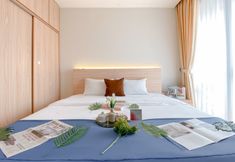 Bedroom 4 New Furnished Studio Apartment at Gold Coast By Travelio