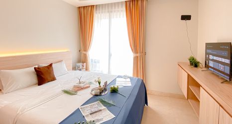 Bedroom 2 New Furnished Studio Apartment at Gold Coast By Travelio