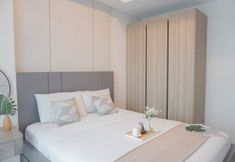 Bedroom 2 Strategic and Modern Designed 1BR Apartment Arumaya Residence By Travelio